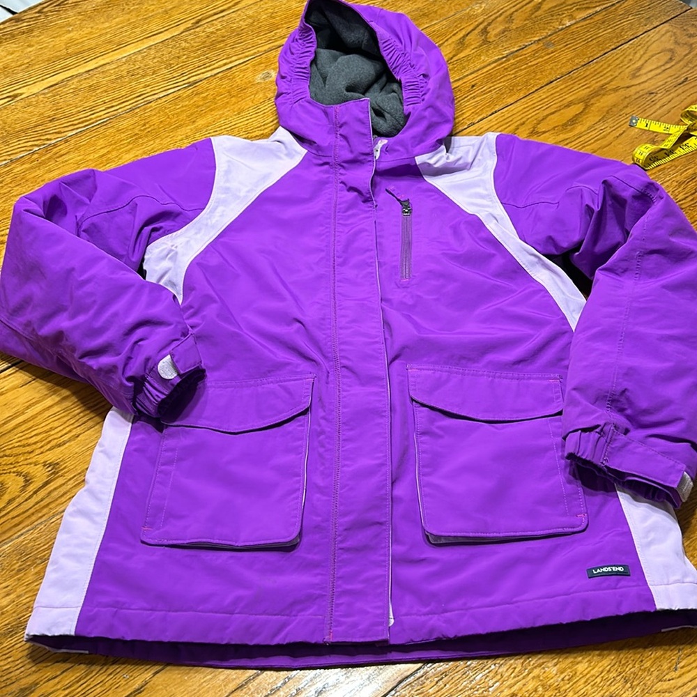 Lands’ End purple/lavender hooded jacket. Zip and Velcro close. Size  XL.